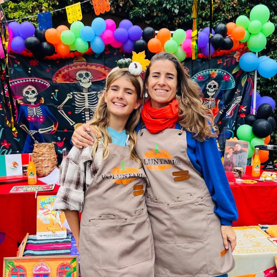Día de los Muertos altar decorated with balloons and marigolds